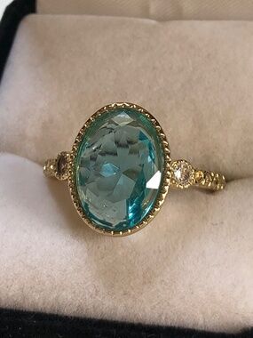 Gold blue stone ring